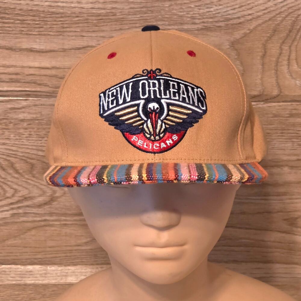 Mitchell & Ness New Orleans Pelicans Snapback Hat Tan Multicolor Striped Brim